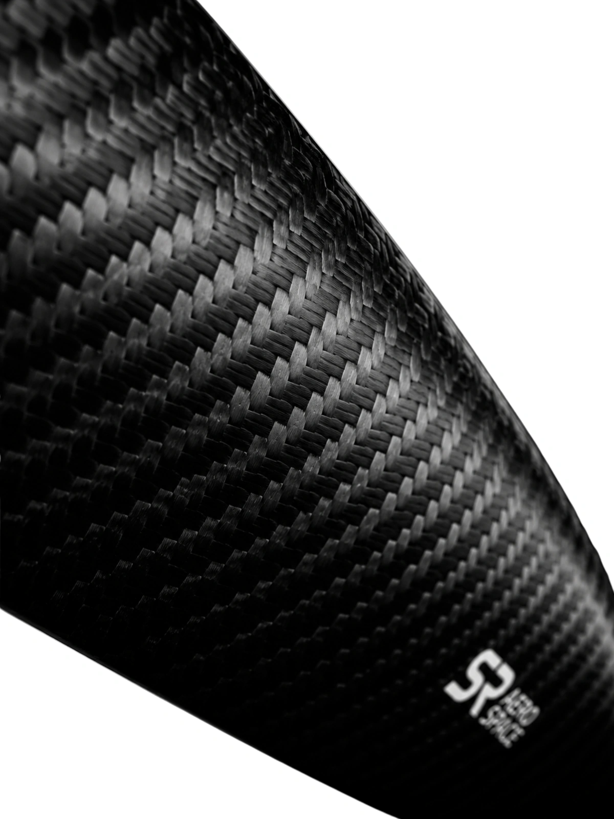 Twill-weave carbon fibre surface of an S R Aerospace propeller blade, macro